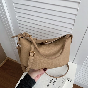 Litchi pattern leather handbag in khaki with golden hardware and adjustable shoulder strap