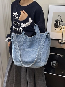 Retro washed blue denim canvas tote bag with contrast stitching for casual daily use
