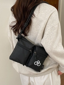 Waterproof black nylon crossbody bag for women with dual zipper pockets and rope strap