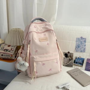 Zaino scolastico rosa con ricamo a farfalla e grazioso ciondolo a forma di coniglio