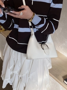 French style creamy white hobo bag with silver buckle and smooth leather finish