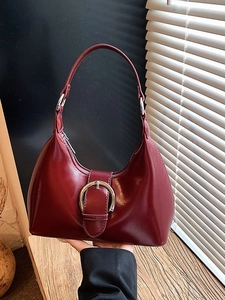 French style burgundy crescent hobo bag in polished leather with silver buckle
