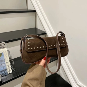 Retro dark brown suede underarm saddle bag featuring silver studs and chic punk style