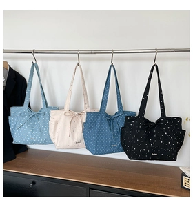 Polka dot canvas tote bags with bows in light blue, white, navy, and black colors
