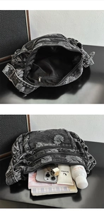 Detail showing the large capacity and multiple zipper pockets of the floral denim bag