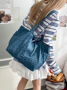 Blue canvas tote bag with white stars print and handmade metal logo for women