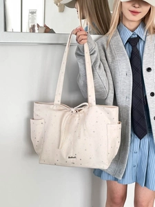 Polka dot bow tote bag in off-white canvas with silver star pattern for women