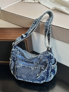 Vintage blue denim crossbody bag with floral embroidery and multiple zipper pockets
