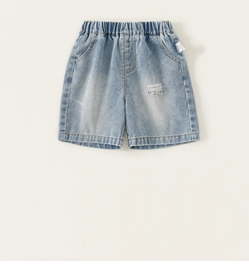 Detail of light blue denim shorts featuring elastic waist and stylish ripped distressed details