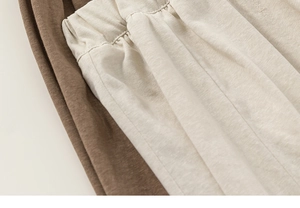 Gros plan sur la taille élastique et le coton doux du pantalon de jogging pour enfant
