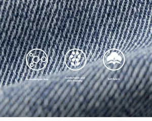 Macro detail of soft blue denim fabric texture highlighting skin-friendly material