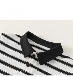Detail of children striped polo shirt neckline with black collar and buttons