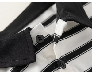 Close-up of black and white striped polo collar with fine knit texture and buttons