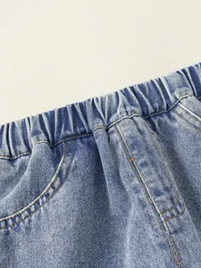 Girls sweet light blue denim shorts with elastic waist and heart embroidery detail