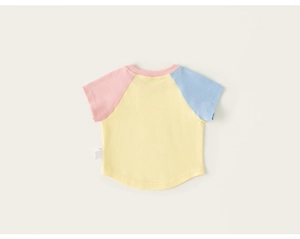 Detail view of cotton kids t-shirt with pink and blue raglan sleeves and curved hemline