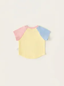 Kids color-block cotton T-shirt in pastel yellow with pink and blue raglan sleeves