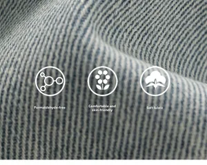 Dettaglio della texture denim morbido con fiocco e perle per pantaloncini da bimba