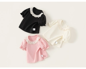 Three infant girls' cotton lace-collar t-shirts in black, cream, and pink colors