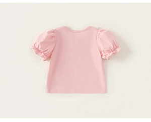Detailed view of pink toddler t-shirt featuring ruffle trim and puff sleeves texture