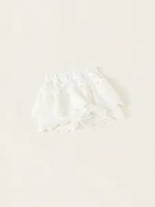 Gonna a balze in pizzo bianco per bambina con vita elastica e ricamo traforato