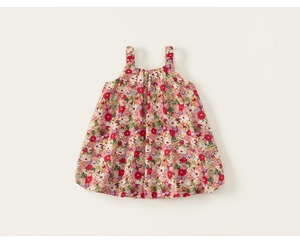 Detail view of colorful floral pattern on lightweight breathable cotton summer dress
