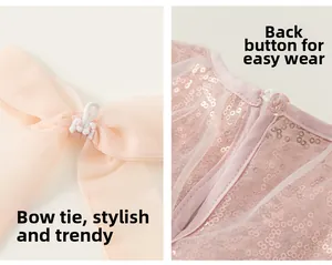 Détails de robe en tulle rose avec corsage à paillettes, bouton dos et nœud