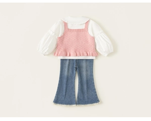 Detail view of pink knit vest with ruffles and denim flare pants for toddler girls