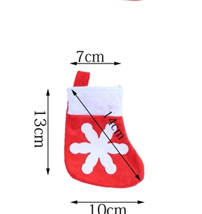 Detailed dimension guide for mini red Christmas stocking cutlery holder with snowflake motif