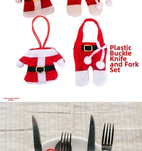 Detail of Christmas cutlery holders in red jacket and pants style with gold buckle