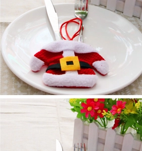 Detail of Santa clothes silverware holder set for Christmas table decoration