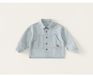 Detailed view of striped cotton shirt for boys featuring squirrel embroidery on a pocket
