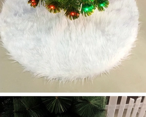 Detail of premium white faux fur Christmas tree skirt with soft plush texture for holiday decor