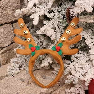 Christmas reindeer antler headband with golden bells and festive holly leaf decorations