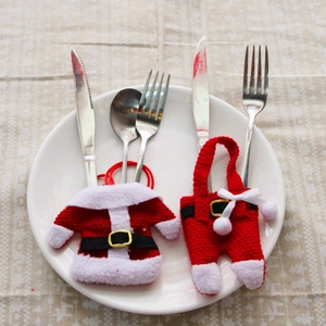 Christmas cutlery holder set with red clothes and pants design for festive table decor