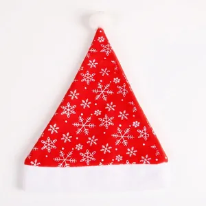 Classic red plush Christmas hat with white snowflake patterns and soft faux fur trim
