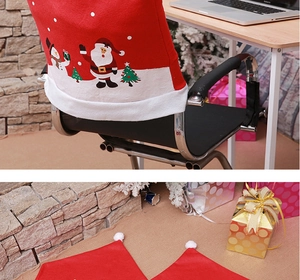 Christmas chair cover featuring Santa Claus print and white trim on red non-woven fabric