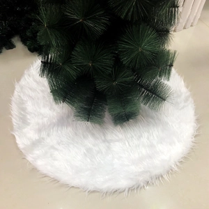 Plush white faux fur Christmas tree skirt for holiday home and hotel decoration