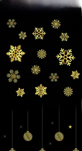 Detail of golden snowflake stickers and hanging ball ornaments for Christmas windows
