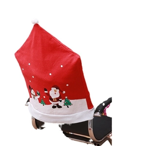 Red Christmas chair cover with Santa and snowman patterns for festive dining decor