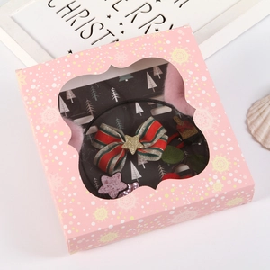 Coffret cadeau rose d'accessoires cheveux de Noël avec nœuds et décorations étoiles