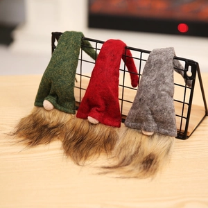 Three-piece set of Christmas gnome ornaments featuring wool felt hats and plush faux fur beards