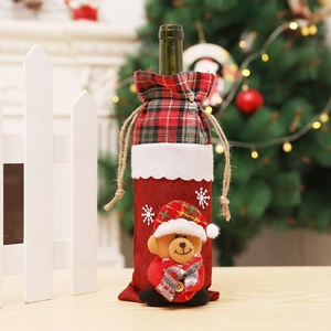 Detail of Christmas wine bottle cover with 3D teddy bear and rustic burlap drawstrings