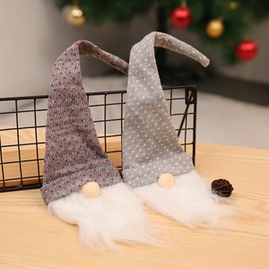 Set of two Nordic Christmas gnomes with knitted hats and long white faux fur beards