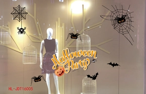 Halloween window stickers set featuring black spiders, orange pumpkins and party text
