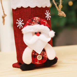 Santa Claus wine bottle cover in red burlap with plush beard for Christmas party decor