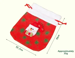 Detail of Christmas drawstring gift bag with 3D snowman and red glitter star patterns