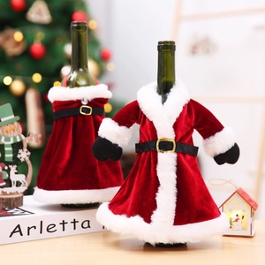 Christmas wine bottle covers featuring a red velvet dress and coat with white fur trim
