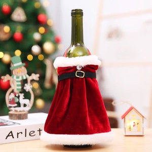 Detail of velvet Santa suit wine bottle cover with faux fur trim and gold buckle belt
