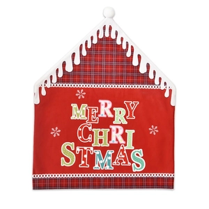 Detail of red Christmas chair cover with Merry Christmas text and red black plaid borders