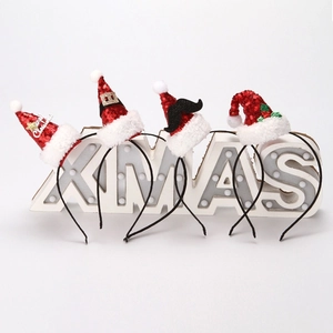 Set of four festive Christmas headbands with sequins, fur trim and Merry Christmas text